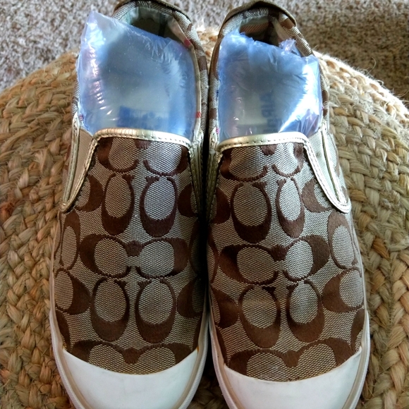 Coach slip-ons